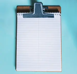 Single Colored Background Image Prints: Top view of notepad on isolated background