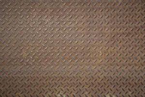 Rusty Metal Surface Prints: Front view of a rusty panel with non-slip surface