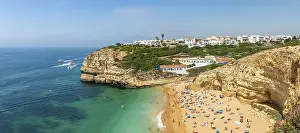Beach Holiday Prints: View of sandy beach with bathers