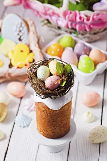 White Wooden Background Prints: Top view small Easter cake decorated with nest and tiny eggs
