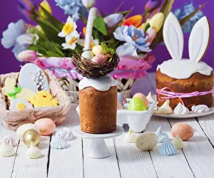 White Wooden Background Prints: Top view small Easter cake decorated with nest and tiny eggs