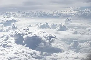 Aerial View Prints: View over towering clouds, cloudy sky