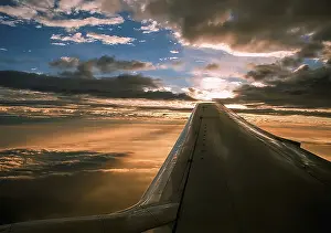 Passenger Plane Window View Prints: The view from the window of a passenger plane during the flight
