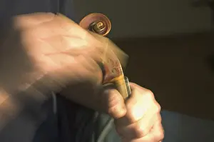 Violin Maker Prints: Violin maker is working at the scroll of a violin