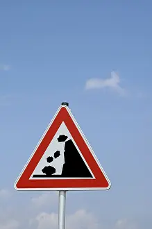 Road Safety Warning Signs Prints: Warning sign Caution: falling rocks