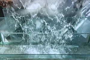 No People Waterscape Prints: Water flows over glass surface
