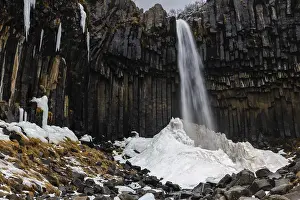 Basalt Columns Iceland Prints: Waterfall, basalt columns, snow