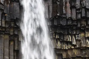 Igneous Rock Formations Prints: Waterfall, basalt columns, winter