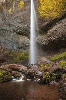 Uninhabited Waterfront Scenery Prints: Waterfall in front of basalt rock