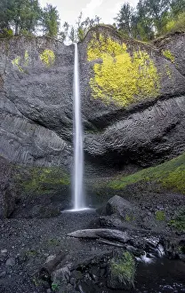 Volcanic Rock Landscapes Prints: Waterfall in front of basalt rock