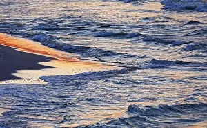 Northern Europe Coastal Scenery Prints: Waves on the beach in the evening light