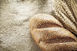 Wheat Bread Prints: Wheat ears bread on burlap background