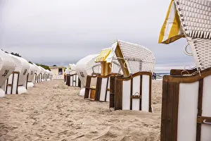 Uninhabited Beaches Prints: White beach chairs on the beach