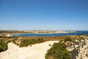 Steep Cliff Views Prints: White cliffs at the coast of Malta