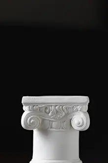 Gothic Style Sculpture Prints: White ionic design column on dark background
