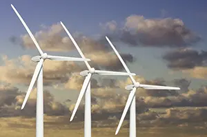 Blue Sky Clouds Prints: Three wind turbines over dramatic blue sky and clouds