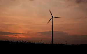 Ecofriendly Renewable Energy Prints: Windmill against evening sky