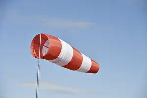 Windy Day In Germany Prints: Windsack, flag, wind direction sensor, Germany