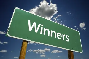 Dramatic Road Sign Prints: Winners road sign with dramatic clouds and sky