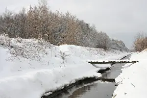 Rural Winter Scene Prints: Winter river with a small bridge