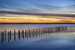 Atmospheric Light Of The Setting Sun Prints: Winter sunset at the Dummer