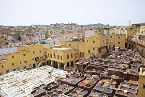 Prints of Workers dyeing leather, basin with dye, dye works, Tannerie Chouara tannery, tanners and dyers district, Fes el Bali, Fez, Kingdom of Morocco Workers dyeing leather, basin with dye, dye works Fez Prints: Workers Dyeing Leather Print, Fez, Morocco