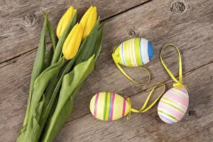 First Day Of Spring Bloomers Prints: Three yellow tulips and three Easter eggs