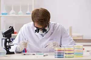 Chemical Analysis Prints: Young chemist working in the lab
