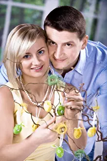 Easter Egg Symbolism Prints: Young couple decorating for Easter