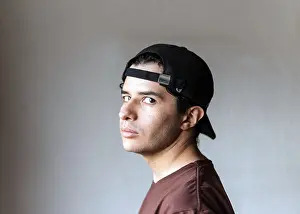 Youthful Facial Expression Prints: A young male with a neutral expression