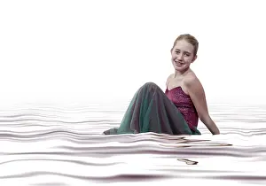 Dancer In Motion Prints: A young modern dancer performing a dance routine