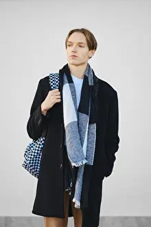 Male Fashion Inspiration Prints: Young student with backpack in old wool coat