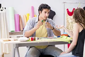 Framed Print : Young Tailor Working in His Workshop Print
