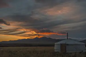 Mongolia Travel Photography Prints: Yurt under dramatical sunset, Mongolia