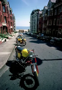 1967 TT Race Print - Colourful Bikes Along the Street