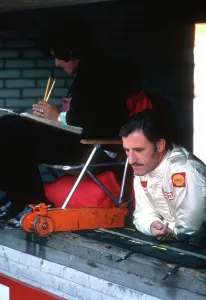 Graham Hill Prints: Graham Hill in Ford-Lotus Garage Print