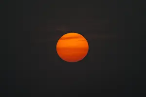 Grey Sky Europe Prints: Close up of sun