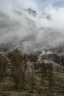 European Mountain Scenery Images Prints: Clouds over snow covered mountain in spring