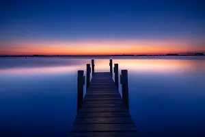 Blue Sky Lake Scene Prints: Jetty after sunset
