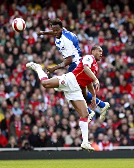 Andre Bikey out jumps Julio Baptista to win the ball Andre Bikey out jumps Julio Baptista to win the ball