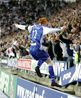 Dave Kitson leaps the advertising boards to celebrate with the fans Dave Kitson leaps the advertising boards to celebrate with the fans