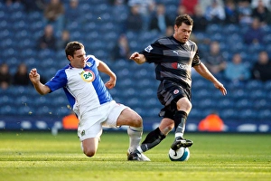 Graeme Murty avoids a challenge from David Dunn Graeme Murty avoids a challenge from David Dunn