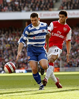 Graeme Murty shields the ball from Denilson Graeme Murty shields the ball from Denilson
