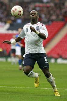 Leroy chases down the ball at the new Wembley Stadium Leroy chases down the ball at the new Wembley Stadium