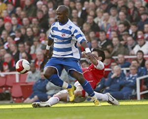 Leroy Lita evades a sliding Cesc Fabregas Leroy Lita evades a sliding Cesc Fabregas