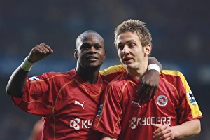Leroy Lita and Kevin Doyle celebrate Michael Essiens own goal Leroy Lita and Kevin Doyle celebrate Michael Essiens own goal