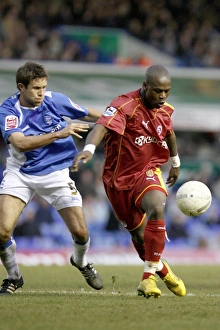 Leroy Lita prepares to shoot under a challenge from Matthew Upson Leroy Lita prepares to shoot under a challenge from Matthew Upson