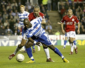 Leroy Lita takes on Rio Ferdinand in the FA Cup 5th round replay at the Madejski Leroy Lita takes on Rio Ferdinand in the FA Cup 5th round replay at the Madejski
