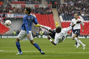 Leroy tries a spectacular shot from the edge of the box for England at the new Wembley Stadium Leroy tries a spectacular shot from the edge of the box for England at the new Wembley Stadium
