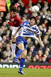 Seol Ki-Hyeon and Gabriel Heinze jump for the ball Seol Ki-Hyeon and Gabriel Heinze jump for the ball